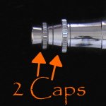 Screw in nozzles have 2 caps on the airbrush's front.