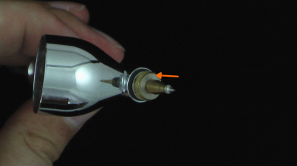 Fit the nozzle onto the airbrush